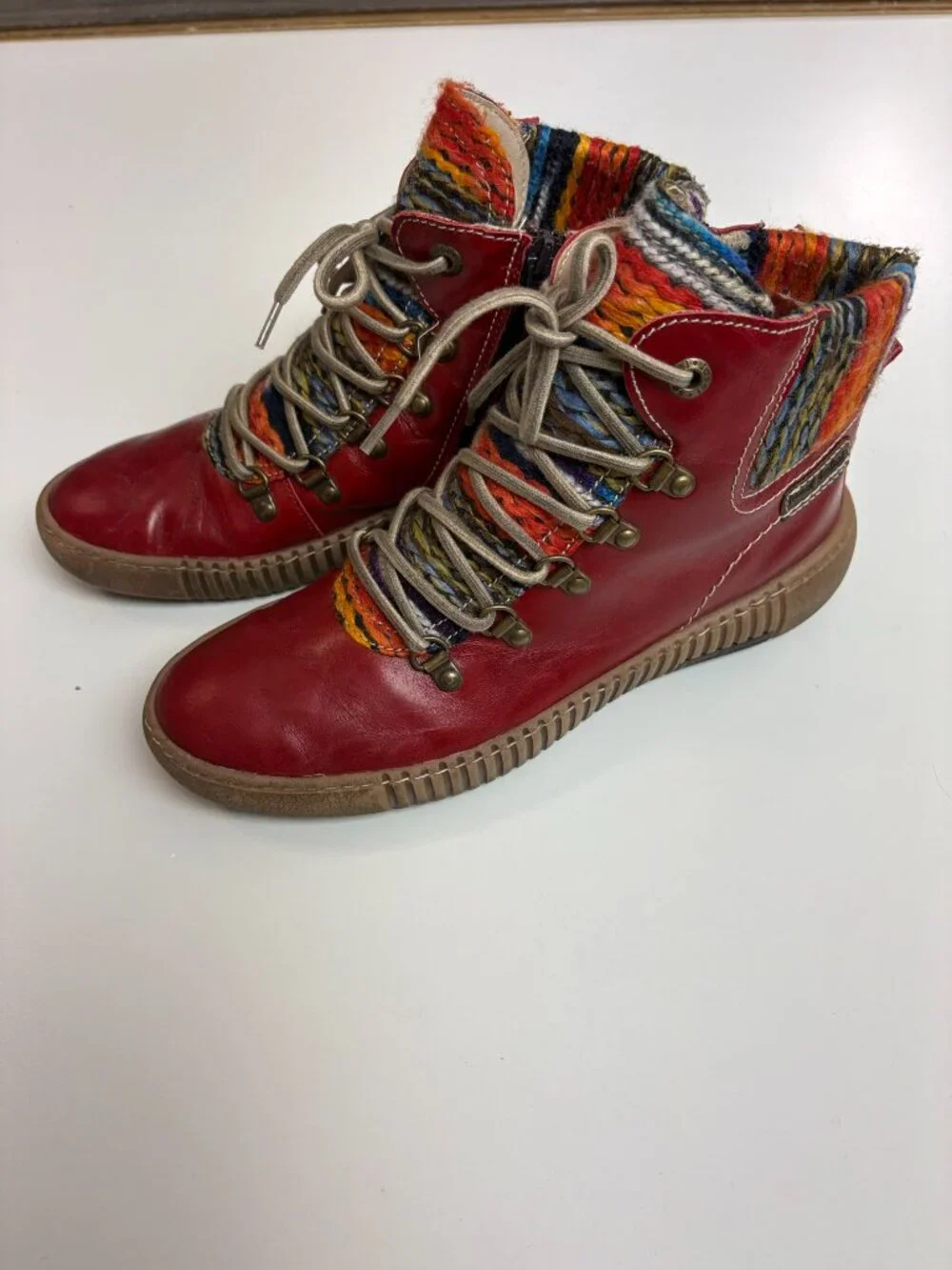 Josef Seibel Maren 06 leather ankle goots in red finish and colorful knit cuff.